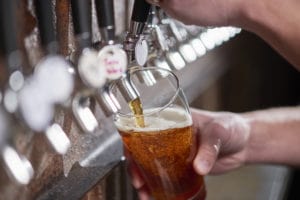 Pouring craft beer into a glass